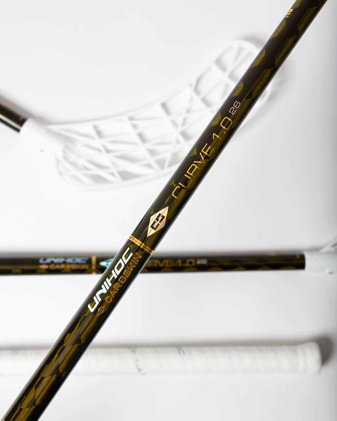 STICK EVOLITE CARBSKIN CURVE 1.0º TITAN 26 GOLD